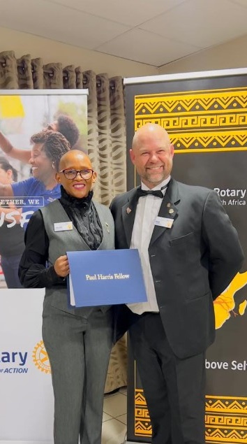 Moitthumi with the incoming President of Rotary E-club of Baobab for the year 2024-2025, Rob Anderson